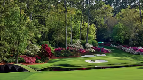 A stunning view of Augusta National Golf Course, showcasing its lush greens and iconic landscape in the heart of USA golf.
