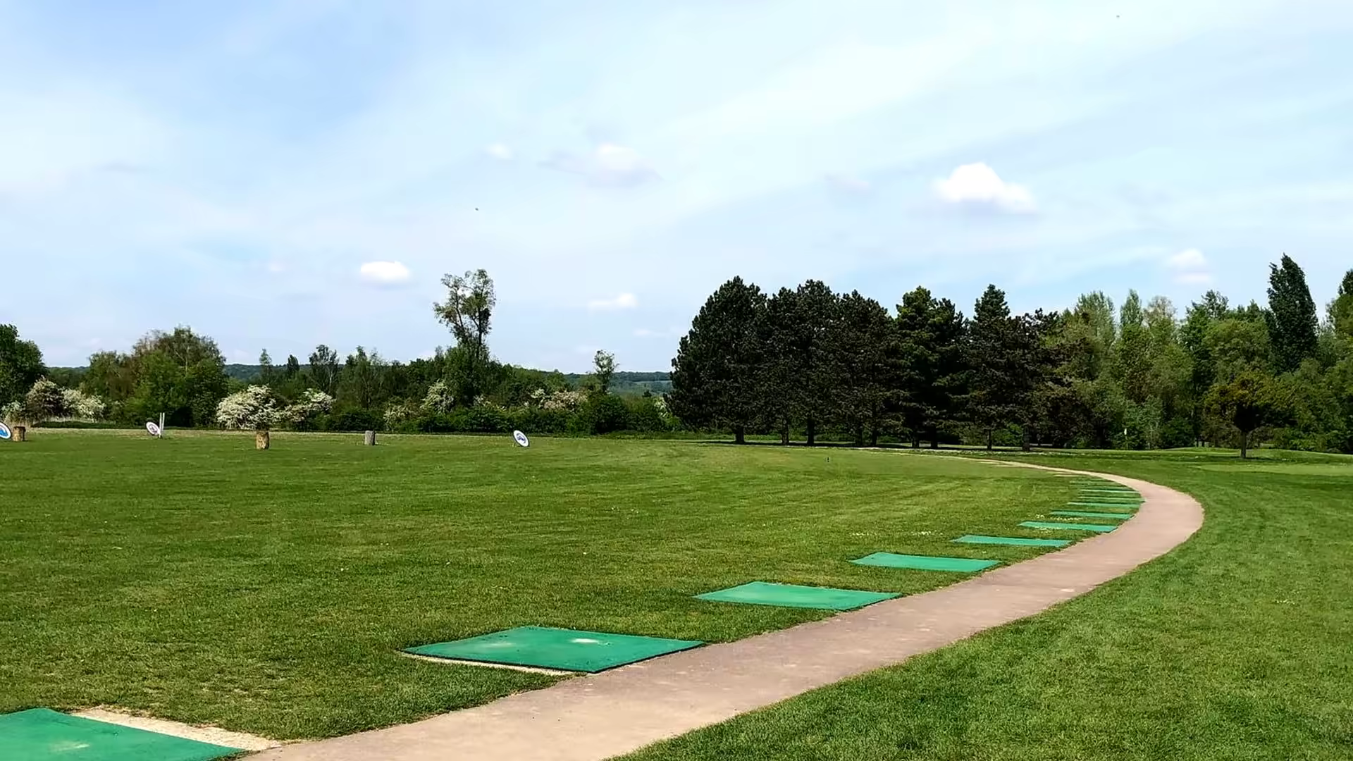 A golfer on the fairways of lery poses course at golf de lery poses, surrounded by the stunning landscape of normandie, france